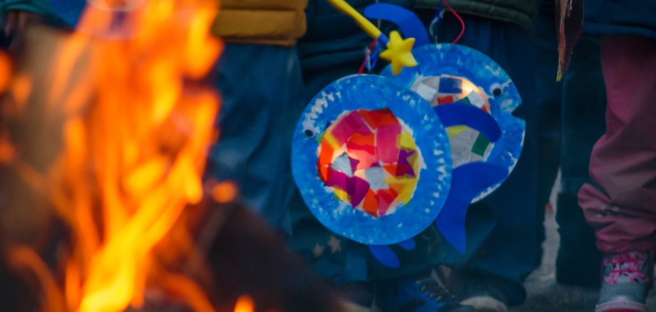 sankt martin day, bonfire and children with lantern defocused sankt martin day, bonfire and children with lantern defocused