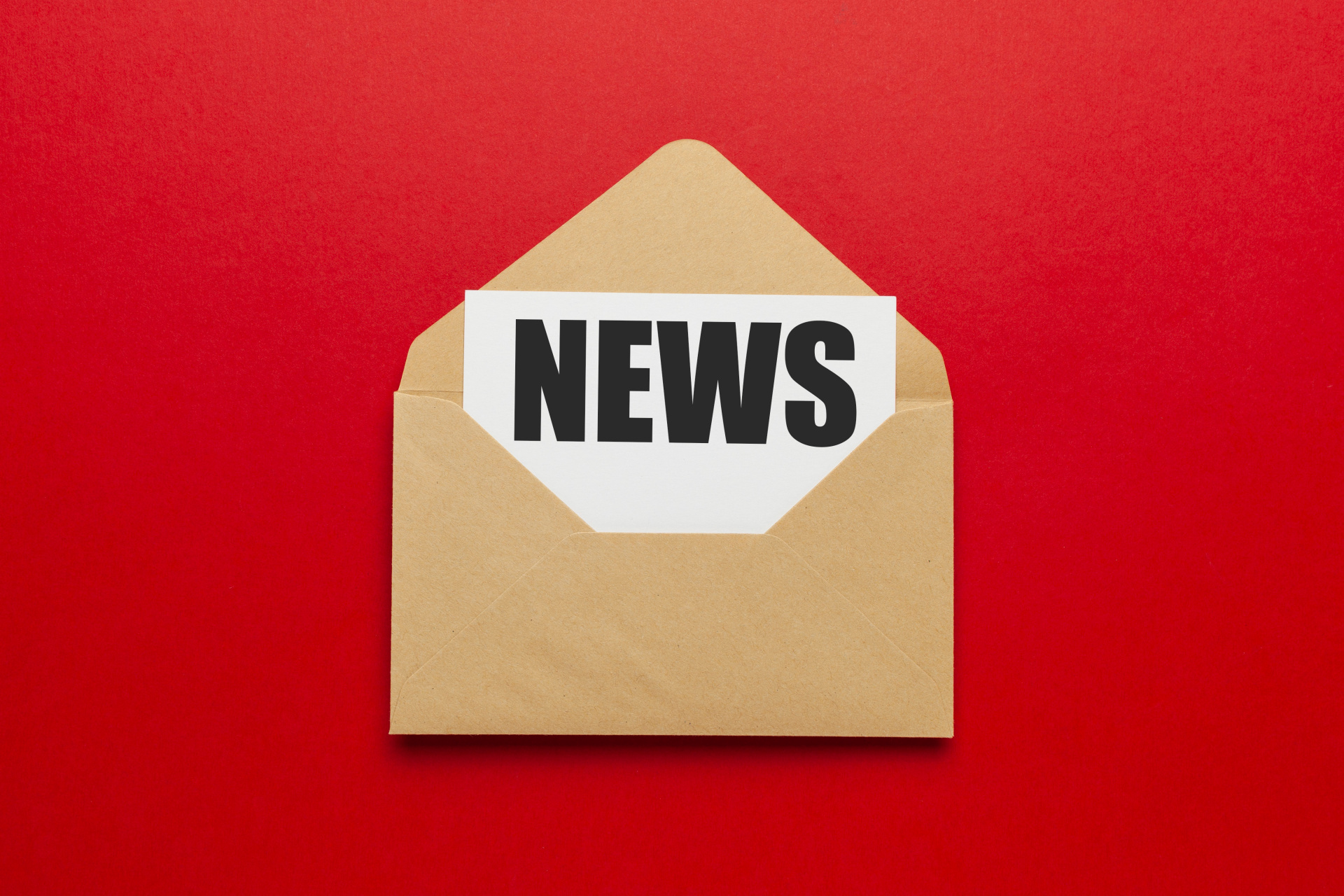 Address mailing of news by e-mail. Advertising message on red background. Address mailing of news by e-mail. Advertising message on red background.