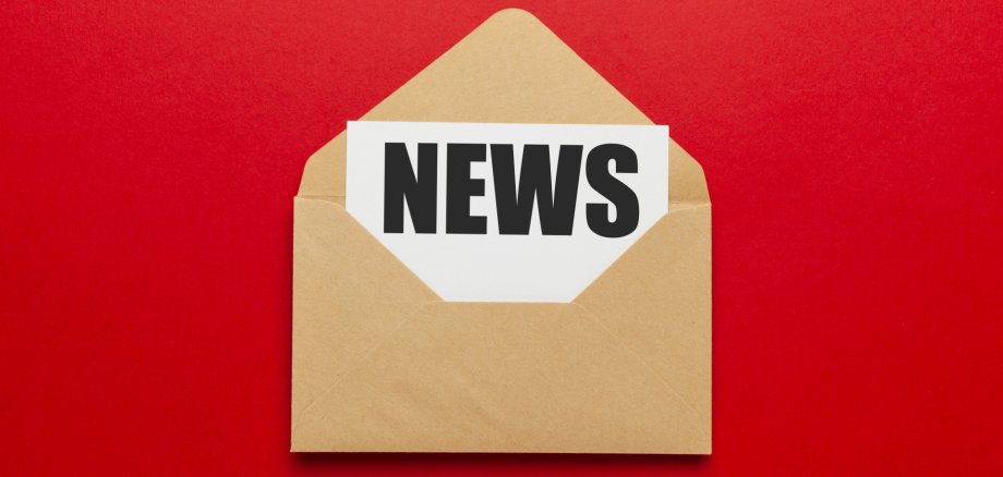 Address mailing of news by e-mail. Advertising message on red background. Address mailing of news by e-mail. Advertising message on red background.