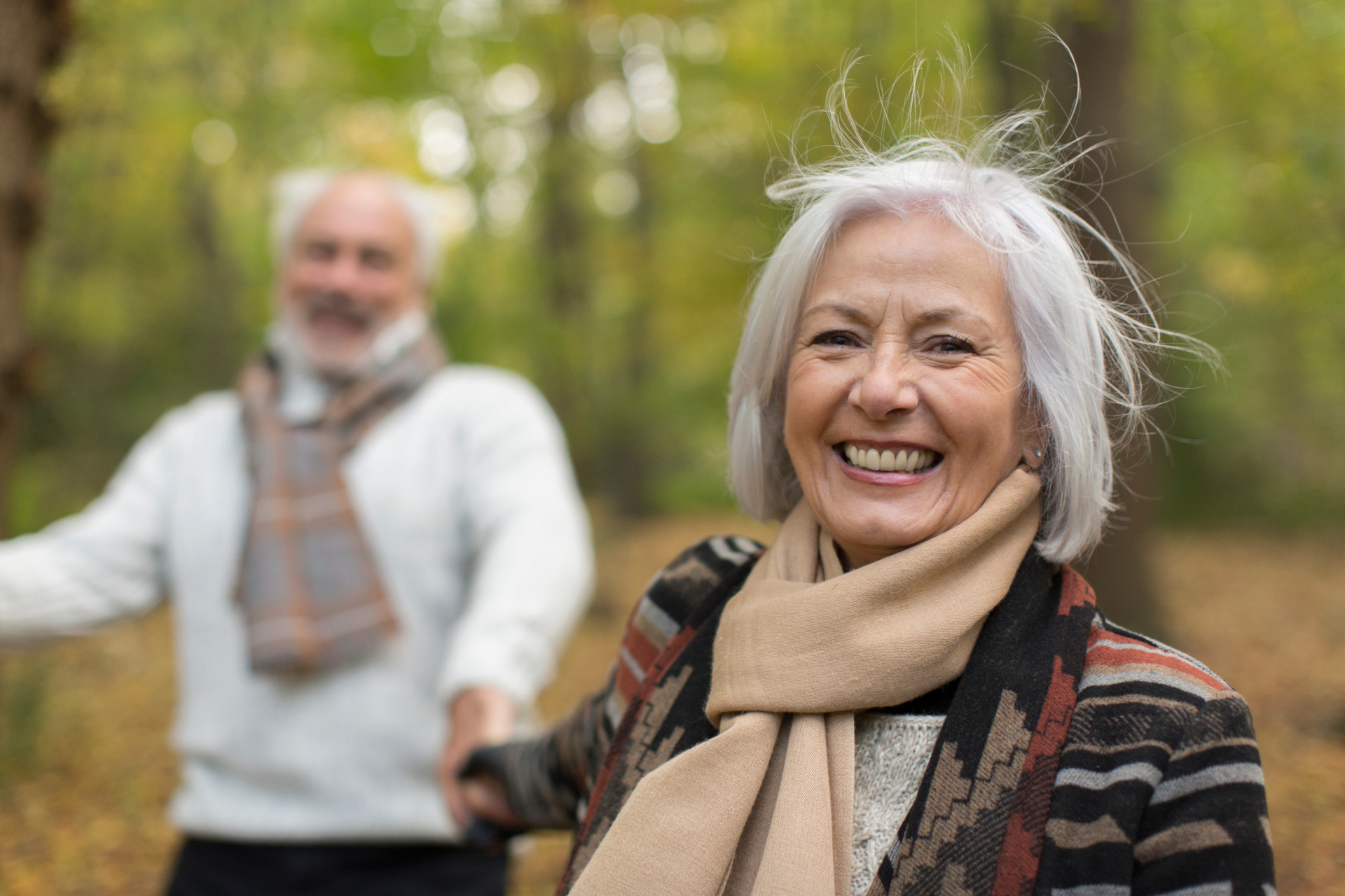 Portrait happy senior woman in autumn park Portrait happy senior woman in autumn park