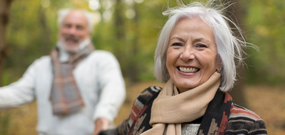 Portrait happy senior woman in autumn park Portrait happy senior woman in autumn park