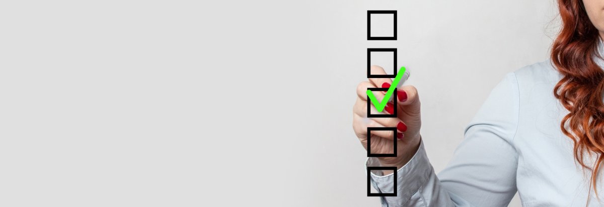 Kästchen mit einem grünen erledigt Häckchen