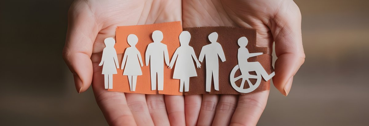 Eine Familie und ein Rollstuhlfahrer aus Papier